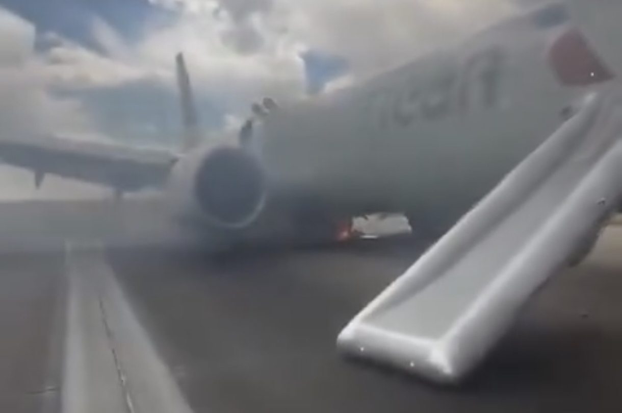 Un avión de American Airlines se incendió y evacuaron a más de 170 pasajeros en medio de las llamas